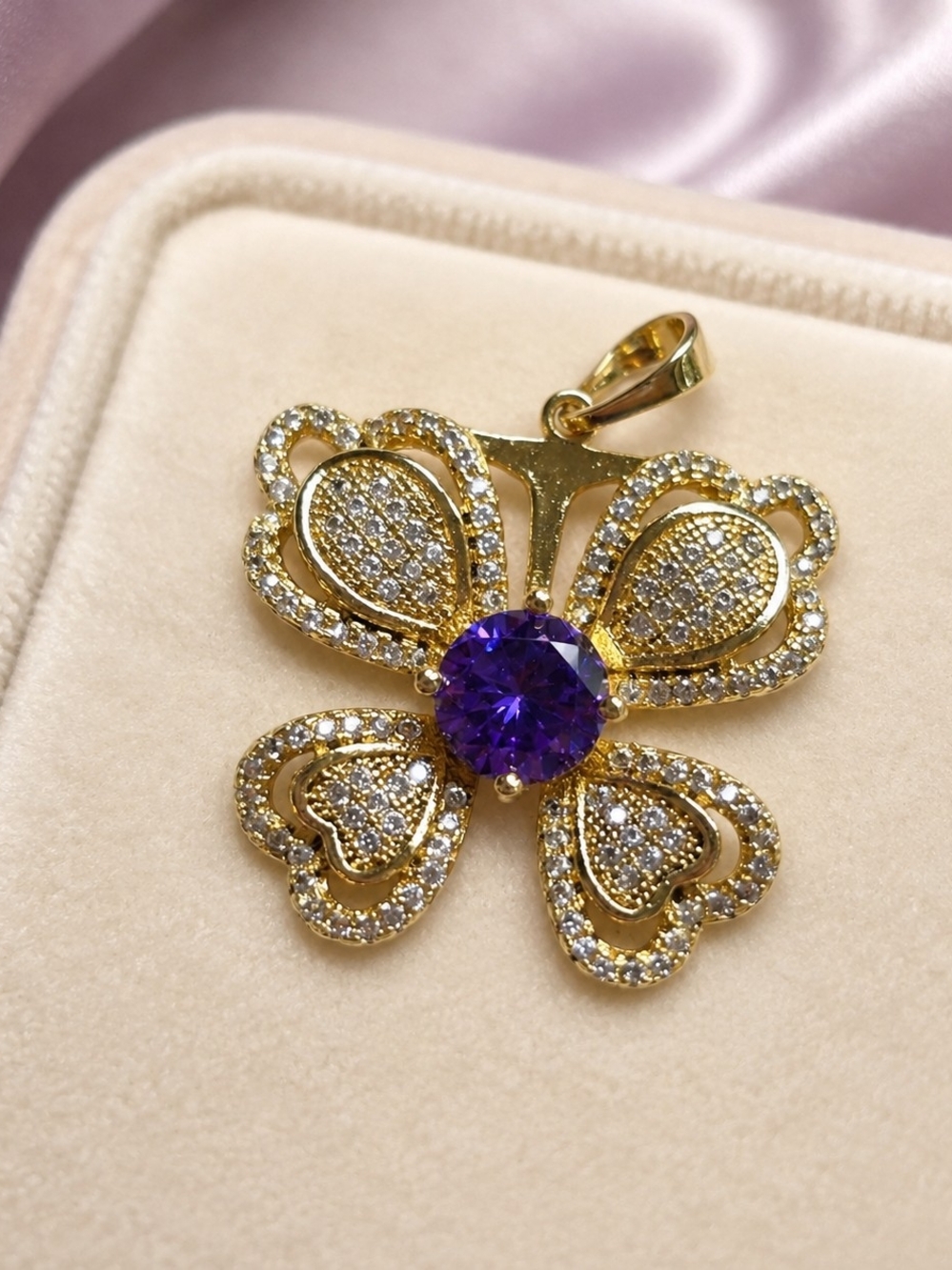 Laminated Gold Butterfly Pendant with Purple Center Stone